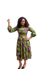 Load image into Gallery viewer, Vibrant African Print Midi Flare Dress With Wrist Band Sleeves.
